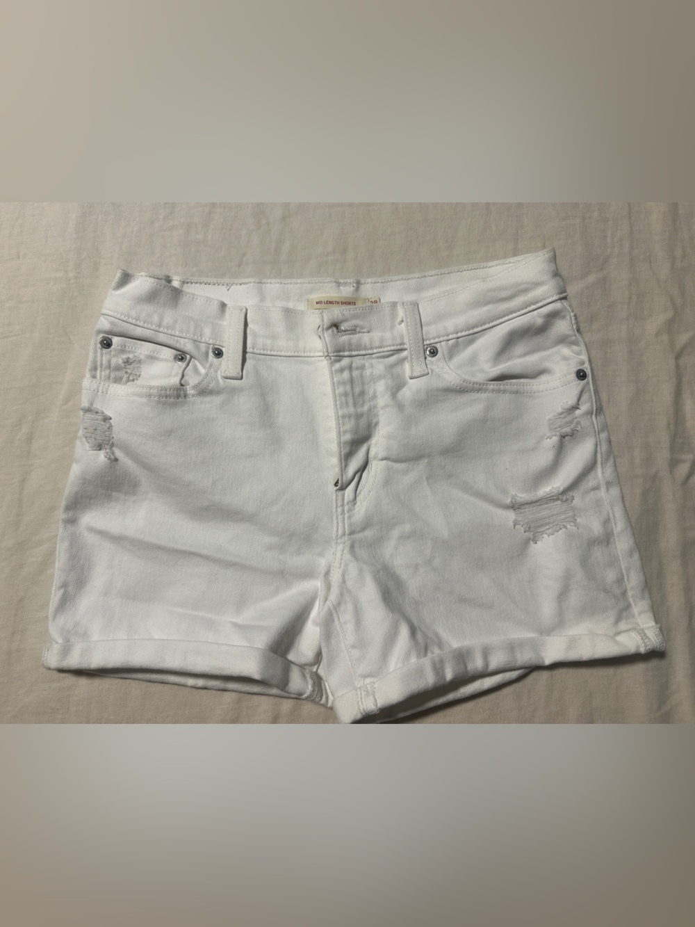 Levi’s White Distressed Women’s Denim Shorts